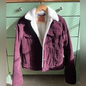 Levi corduroy jacket, Sherpa lined, size small. Color is maroon/oxblood.